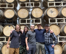Fermentation Sciences majors Finn Adams (left), Chris Martin (second from left), and Dominic Bernardi (third from left) learned about winemaking from Will Burrow ’20 (fourth from left), head winemaker at Grandfather Mountain Vineyard in Banner Elk.