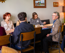 Erik Martella, wine specialist and lecturer in the Appalachian State University Department of Chemistry and Fermentation Sciences, member of the CAS Advancement Council, and proprietor of Erik Martella Wines, chats with students at Vidalia Restaurant and Wine Bar before the beginning of the inaugural "Wine and Fine Dining for Emerging Professionals" program. Photo by Lauren Gibbs