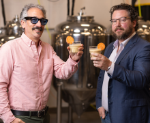 App State professor Dr. Brett Taubman, left, and Fermentation Sciences Lab manager Daniel Parker have developed the sweetpotato milk Rootsii in fermentation lab facilities at App State. The locally sourced, sustainable and allergy-friendly product received $1.82 million in funding from NCInnovation, with a goal of bringing the milk from proof of concept to store shelves over the next two years. Photo by Chase Reynolds App State professor Dr. Brett Taubman, left, and Fermentation Sciences Lab manager Daniel Parker have developed the sweetpotato milk Rootsii in fermentation lab facilities at App State. The locally sourced, sustainable and allergy-friendly product received $1.82 million in funding from NCInnovation, with a goal of bringing the milk from proof of concept to store shelves over the next two years. Photo by Chase Reynolds